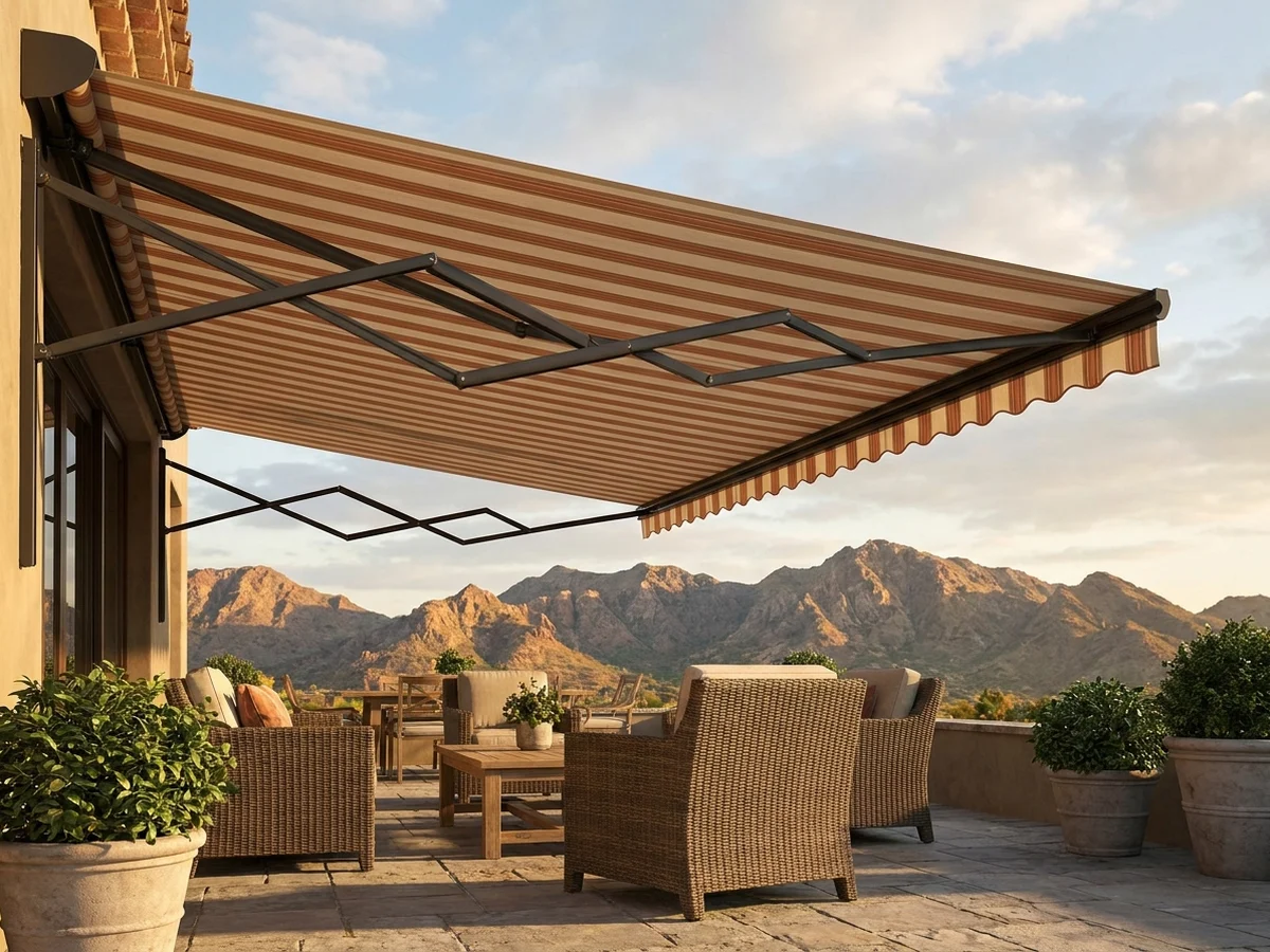 Folding-arm awning extended over a Somerset West patio, wind-rated for the south-easter